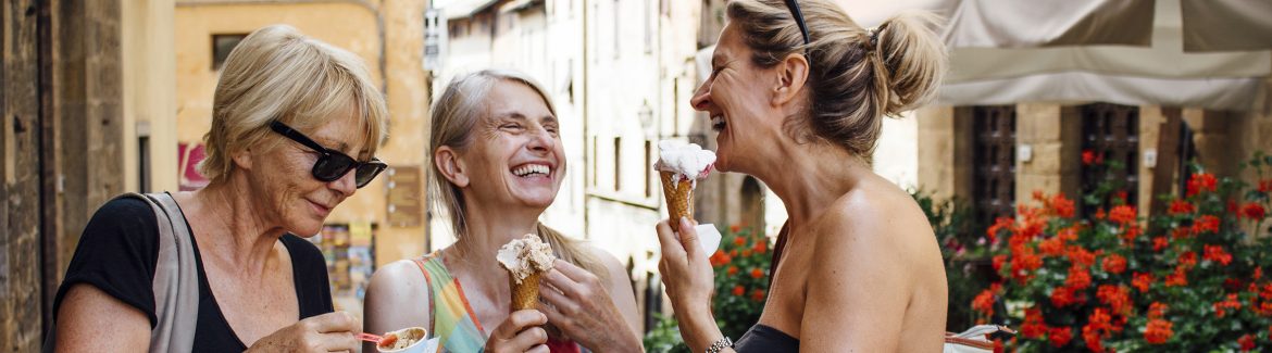 Female Friends Enjoying Italian Ice-Cream